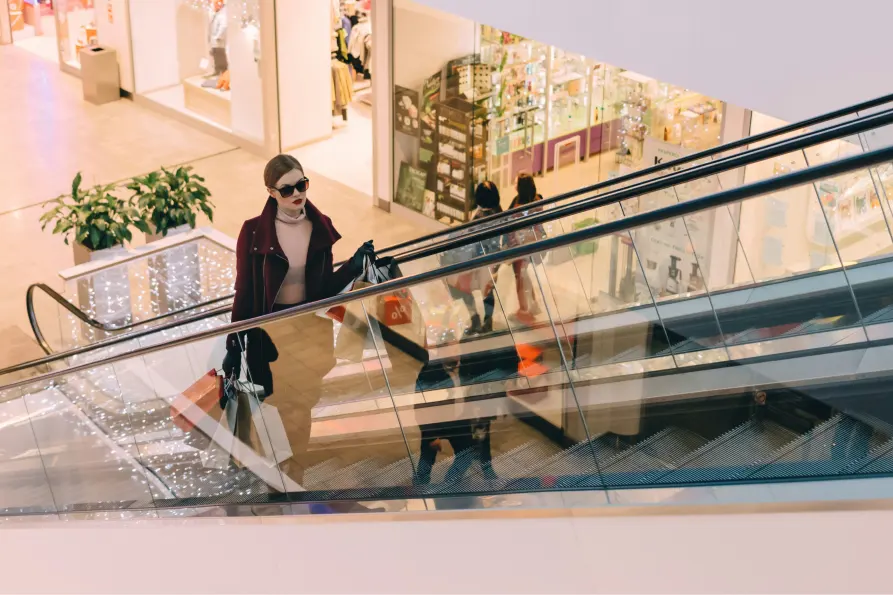 Person using wayfinding in shopping mall